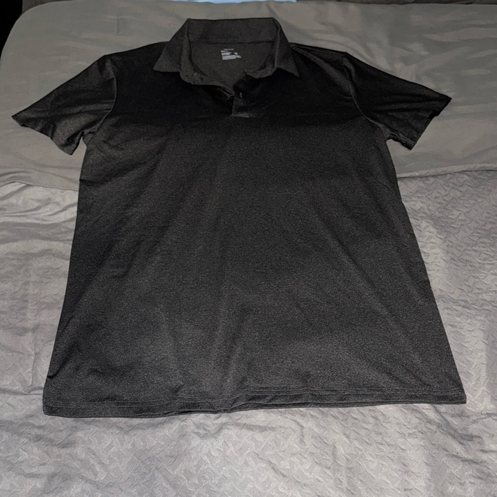 I am selling a black mesh golf shirt. Never worn.